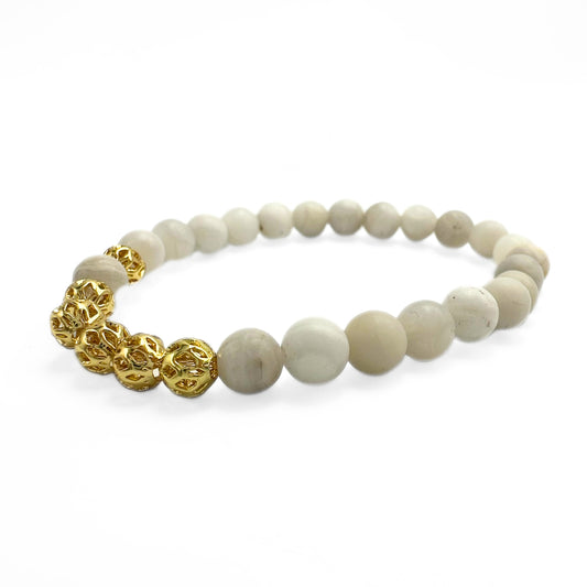 Phoenix agate gold bracelet with hollow charms